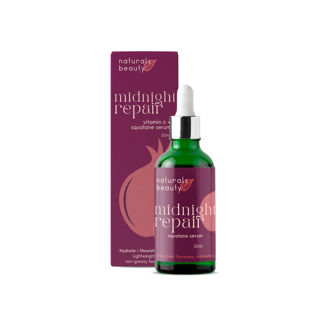 Naturals Beauty Green serum bottle and purple packaging with 'midnight repair' text on a white background